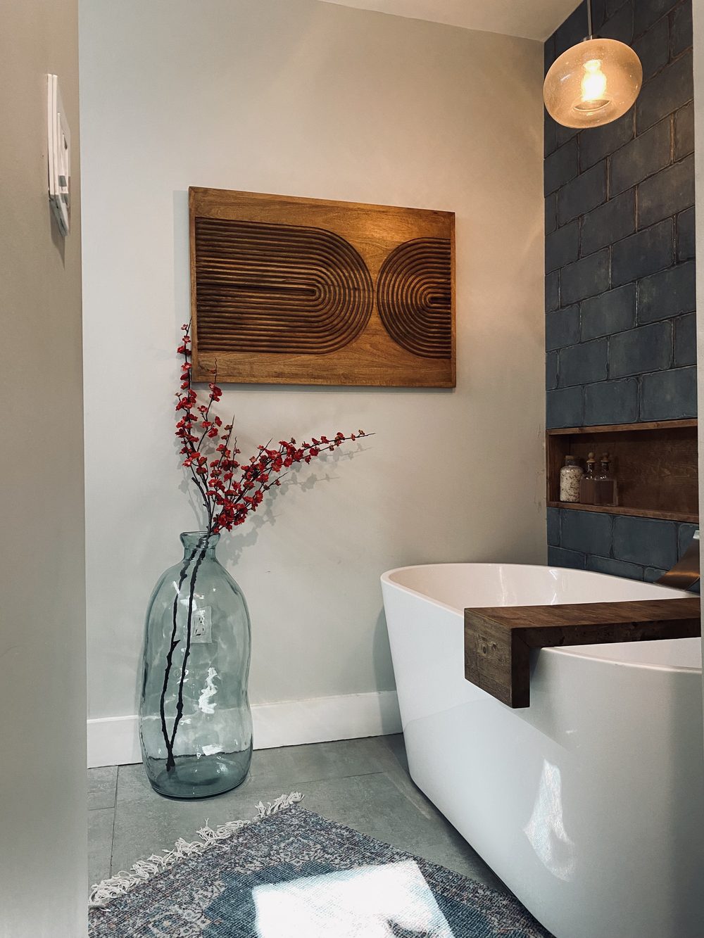 Finished bathroom remodel with freestanding tub by Bravo Zulu Restoration